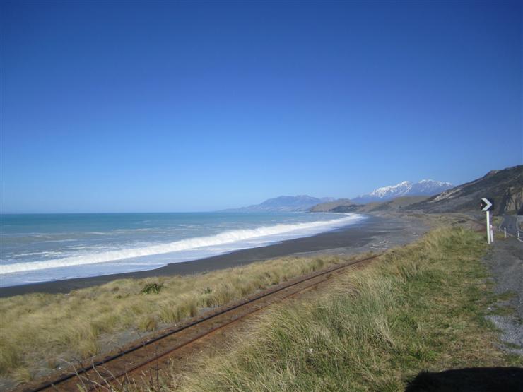 Beach and main railway line next to Highway 1 on the way to Kaikoura