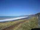 Beach and main railway line next to Highway 1 on the way to Kaikoura