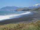 Beach and main railway line next to Highway 1 on the way to Kaikoura