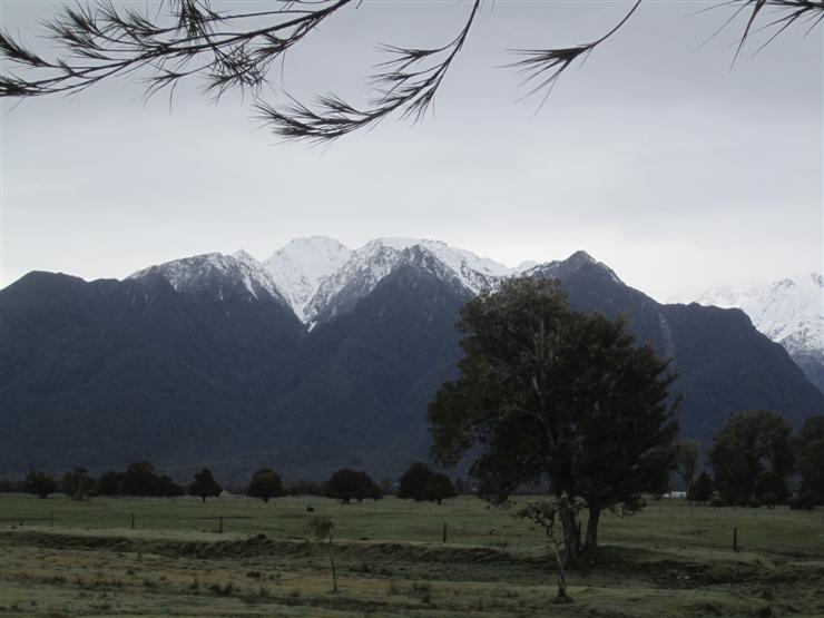 Mount Cook and mountain friends as seen from Lake Matheson